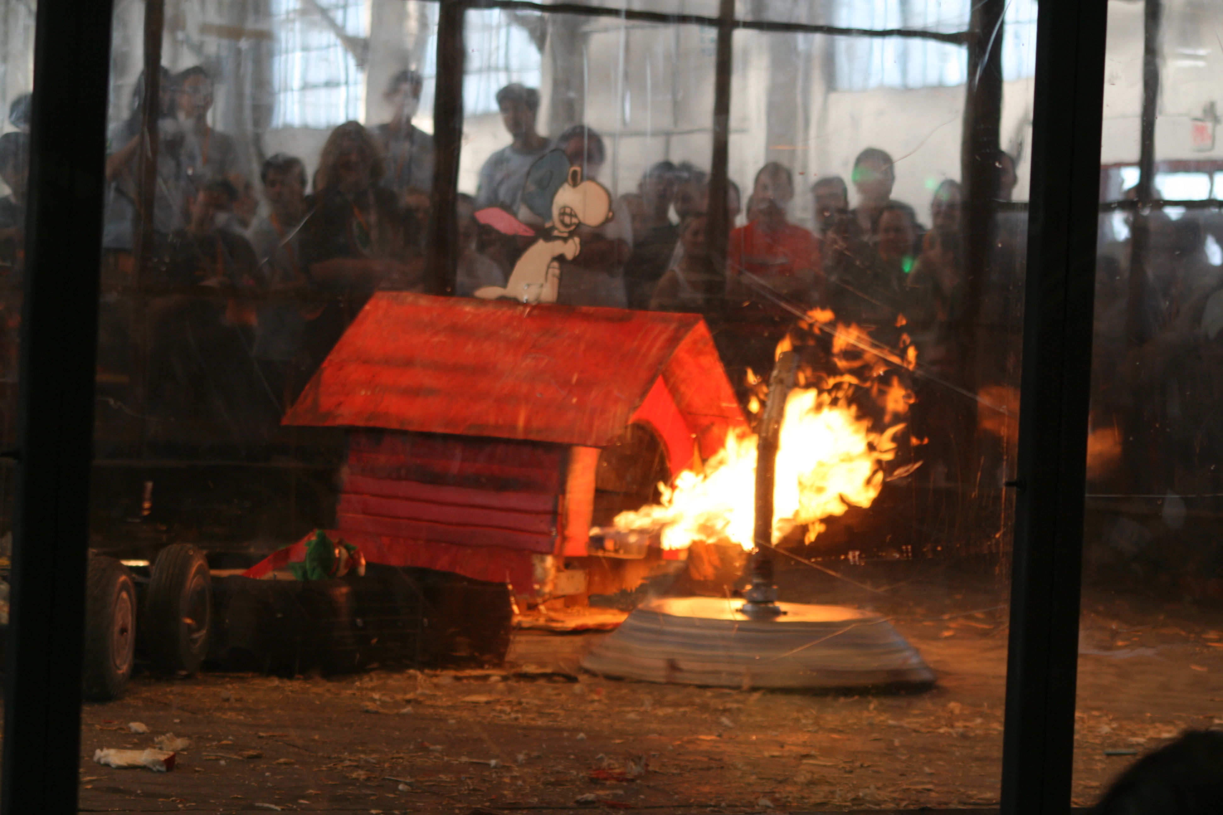 Robot combat arena with flame weapon